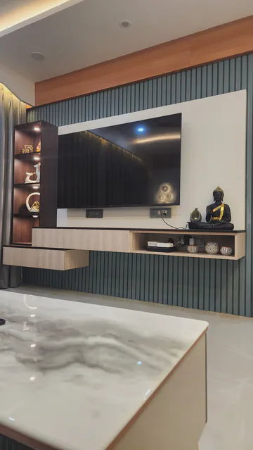 Sleek entertainment unit with marble backdrop and integrated lighting