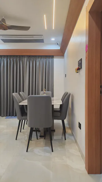 Modern dining area with sleek furniture and contemporary design elements