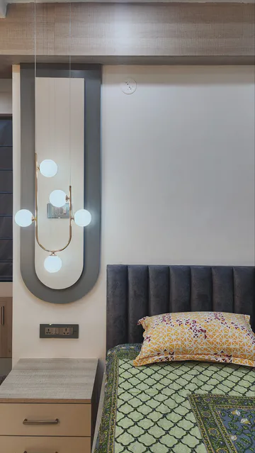 Modern bedroom with integrated study area and smart storage solutions