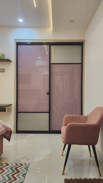 Modern living space with geometric ceiling design and contemporary furnishing