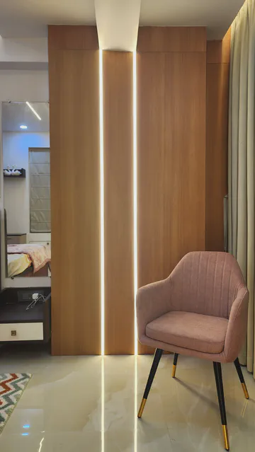 Contemporary entertainment wall with artistic lighting and modern design