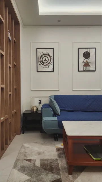 Contemporary living space with wooden elements and modern furnishing