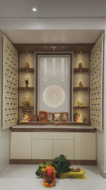 Elegant pooja room with traditional design elements and warm lighting
