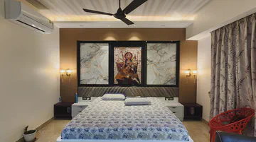 Luxurious master bedroom with traditional artwork and premium finishes