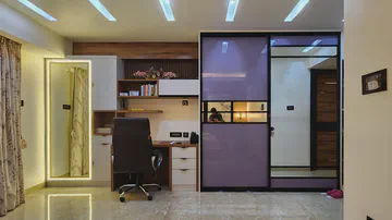Contemporary bedroom suite with workspace and elegant design elements