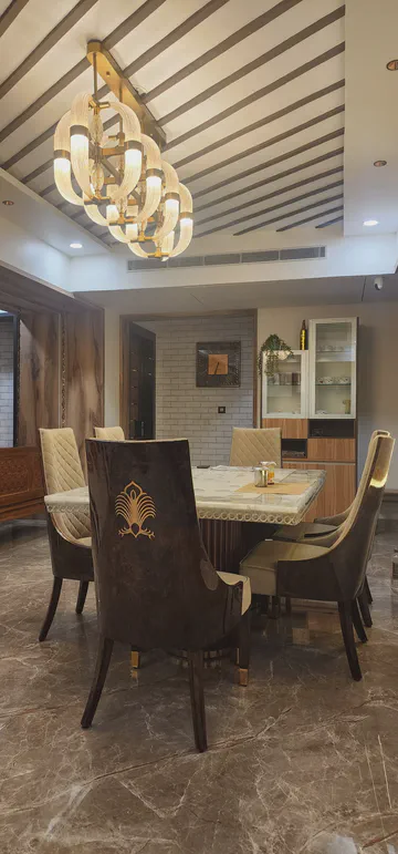 Modern kitchen with integrated dining and contemporary design elements