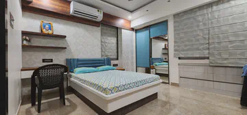 Elegant living space with traditional artwork and premium materials