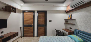 Modern bedroom with sophisticated design and contemporary amenities