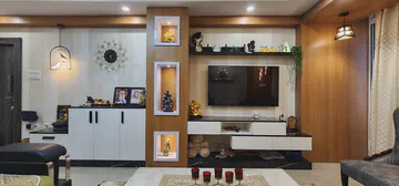 Contemporary living room with traditional display niches and modern furnishing